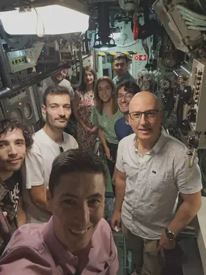 Group photo inside the submarine