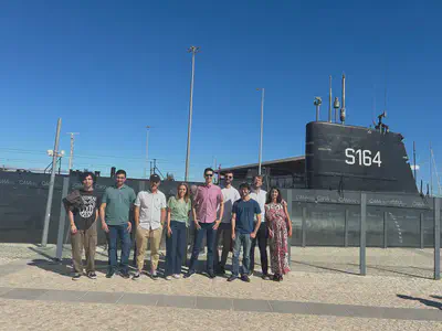 Group photo in front of the Barracuda Submarine