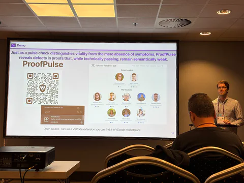 Álvaro presenting the closing slide of the ProofPulse demonstration.