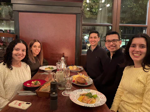 A group enjoying dinner together in Munich.