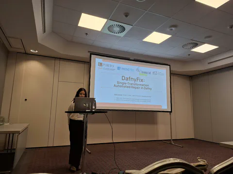 Isabel introducing DafnyFix at the APR workshop.